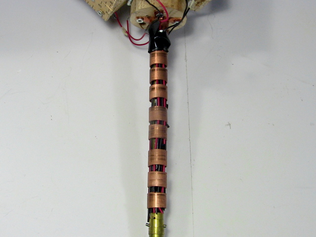 The shaft with copper rings for the DIY/homemade slip rings.