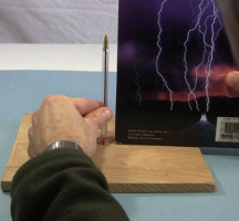 Use a book to make the pen perpendicular to the base.
