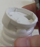 A gutted CFL with just the tube and wires and no electronics.
