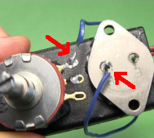 Blue coil's ends are soldered to the potentiometer and to the transistor's base pin.