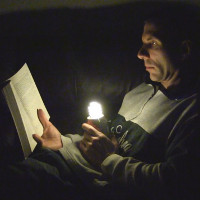 Reading using a compact fluorescent lightbulb powered using a joule thief circuit.