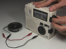 Tuning the radio to a station before measuring the resistance
      of the photoresistor/photocell.