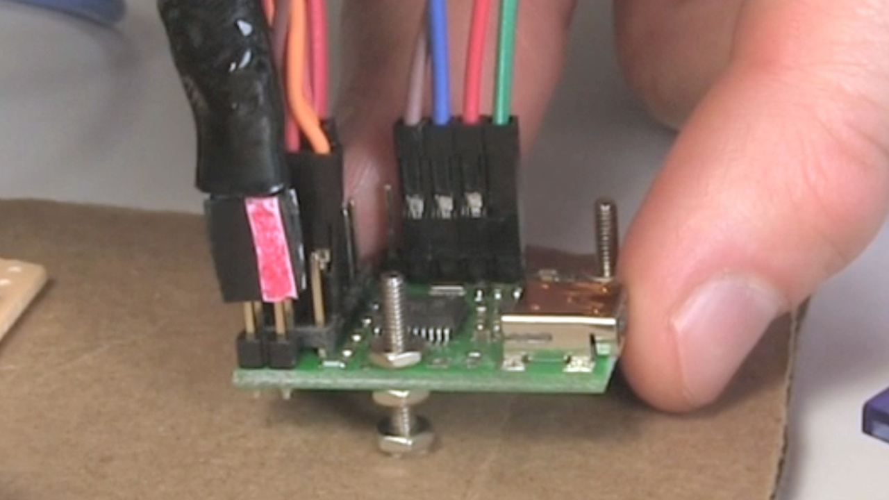 Plugging the cable into the motor controller board.