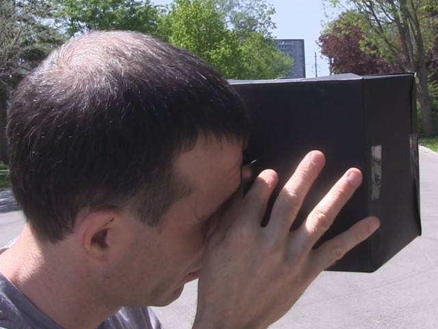 How to make a pinhole camera from a single poster board sheet.