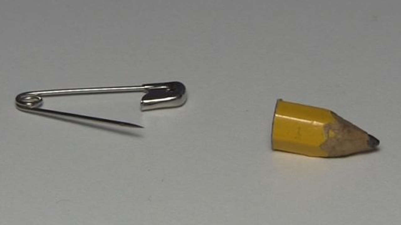 The clothes pin and pencil for the razor blade diode.