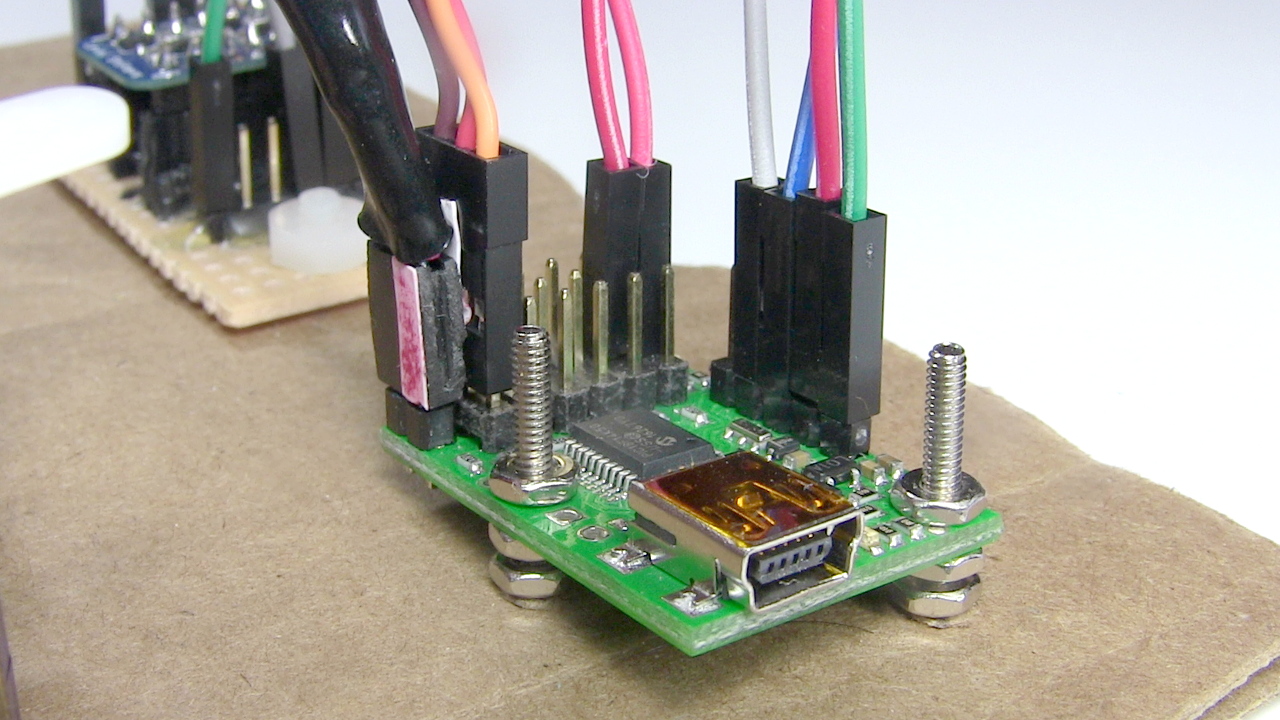 Close-up of Maestro board wires for controlling one servo.