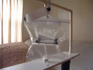 Animated gif made from movie of Poynting flow thruster test 
      with paper strips redirecting ionized airflow from bare wires.